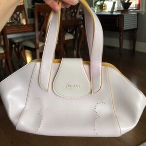 Pale pink bowling bag purse with yellow piping